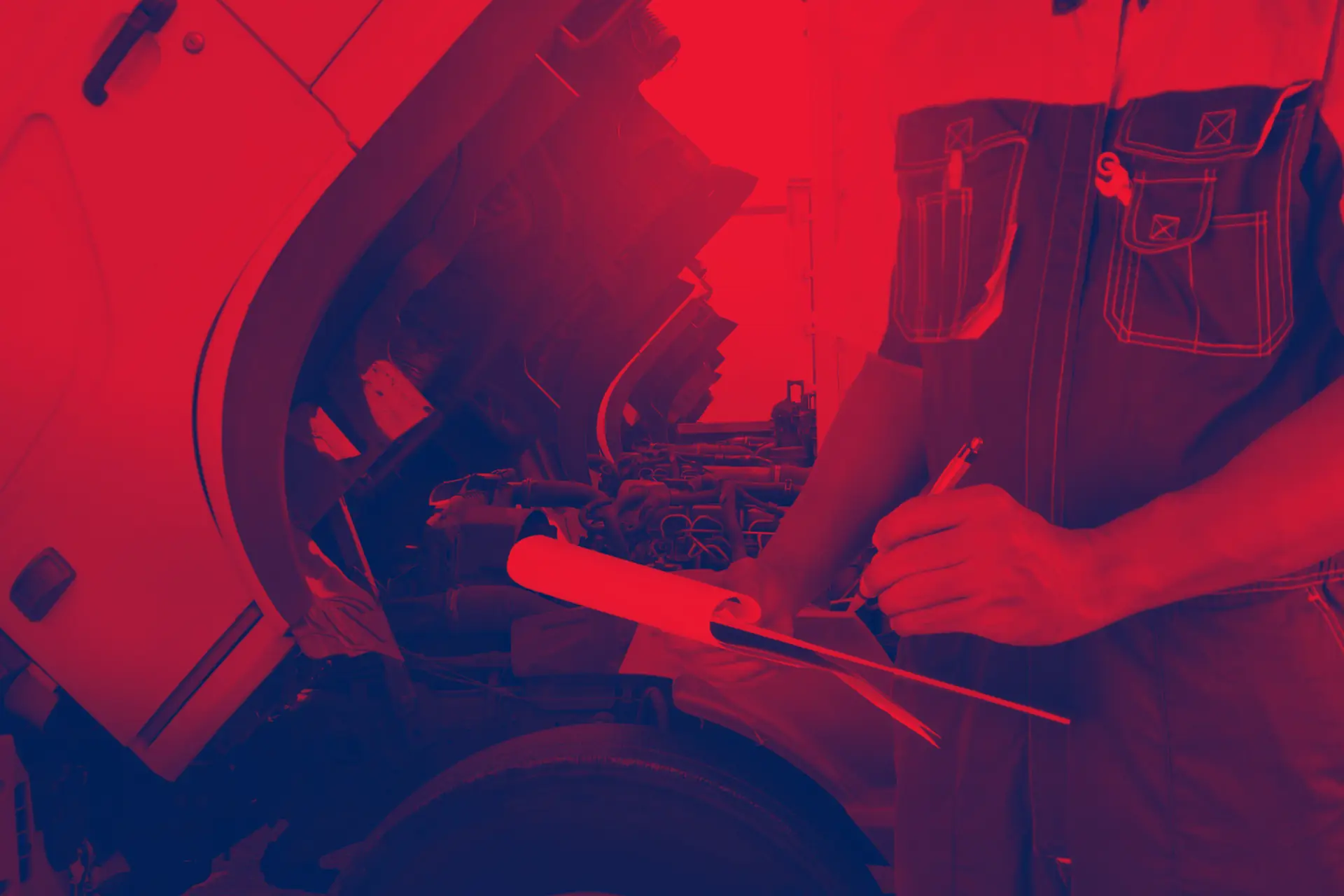 Diesel technician working on a truck engine